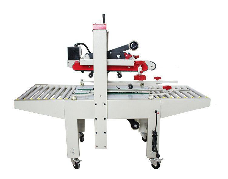 Fxj-6050 Kecepatan Tinggi Adjustable Top Bottom Tape Electric Stable Automatic Cartons Box Box Sealer Mesin Penutup Karton