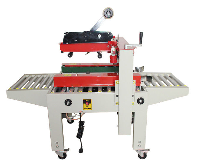 FXJ-6050 Up And Down Drive Belt Sealer Karton Dengan Mesin Penutup Karton Pita