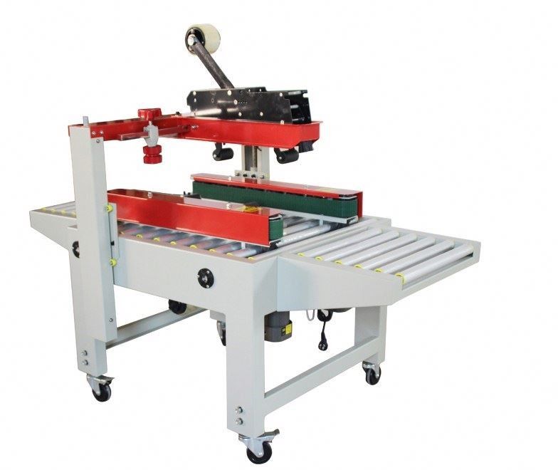 FXJ-6050 Up And Down Drive Belt Sealer Karton Dengan Mesin Penutup Karton Pita
