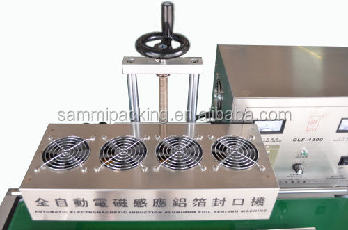 Mesin pengemasan botol induksi elektromagnetik terus menerus Mesin pengemasan minuman makanan semi-otomatis 50mm hingga 120mm